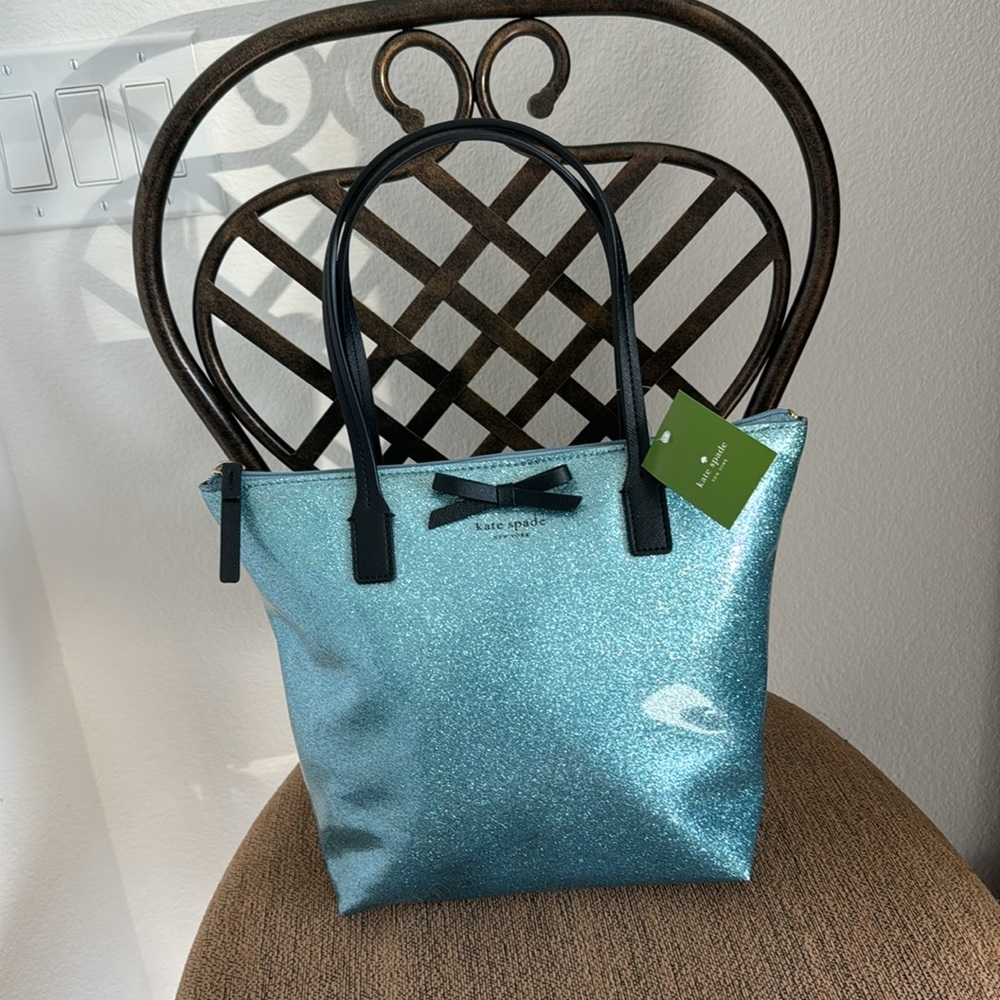 NWT Jeralyn Mavis Street light blue glitter bag.